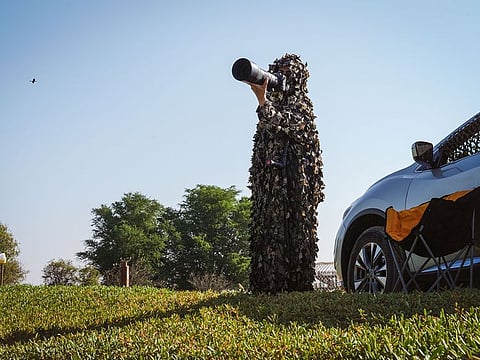 Salma Al Suwaidi in action in her specially designed camaflouge abaya outfit.