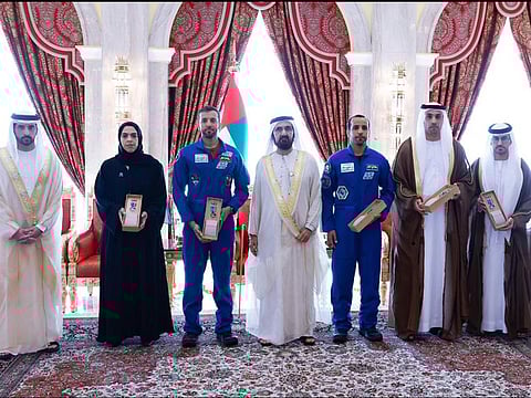 His Highness Sheikh Mohammed bin Rashid Al Maktoum, Vice President and Prime Minister of the UAE and Ruler of Dubai and Sheikh Hamdan bin Mohammed bin Rashid Al Maktoum, Crown Prince of Dubai, Deputy Prime Minister and Minister of Defence of the UAE, and Chairman of The Executive Council of Dubai, with the five winners of the Space Medals in Dubai.