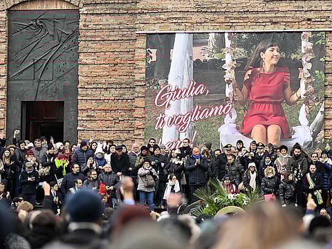 People attend the funeral of Giulia Cecchettin, a university student killed by her ex-boyfriend, one of the country's most recent and shocking episodes of femicide, in Padova on December 5, 2023.