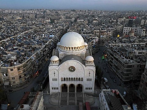 This areal view shows the Greek Catholic Cathedral of Aleppo, in the northern Syrian city of Aleppo, on December 3, 2024. On November 27, the Islamist Hayat Tahrir Al Sham (HTS) alliance led a major offensive snatching Syria's second city Aleppo and dozens of towns and villages from government control, after years of regime gains in successive Russian-backed military campaigns.