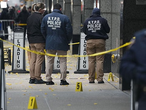 Crime Scene Unit police work at the scene where CEO of UnitedHealthcare Brian Thompson, 50, was shot as he entered the New York Hilton early on December 4, 2024 in New York.