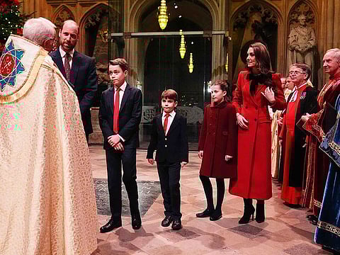Britain's Catherine, Princess of Wales (R), Britain's Princess Charlotte of Wales (2R) and Britain's Prince William, Prince of Wales (L) Britain's Prince George of Wales (2L) and Britain's Prince Louis of Wales (C) arrive to attend the "Together At Christmas" Carol Service" at Westminster Abbey in London on December 6, 2024.