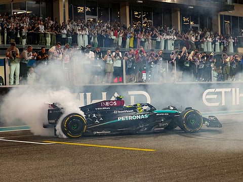Lewis Hamilton performs donuts after finishing his last race for Mercedes at the Formula 1 Etihad Airways Abu Dhabi Grand Prix 2024 at Yas Marina on Sunday.