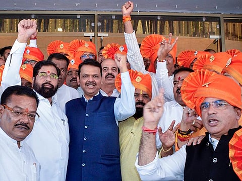 Mumbai, Dec 07 (ANI): Maharashtra CM Devendra Fadnavis with state Deputy Chief Ministers Eknath Shinde and Maha Yuti MLAs attend the special session of the Maharashtra Legislative Assembly, at Vidhan Bhavan in Mumbai on Saturday.