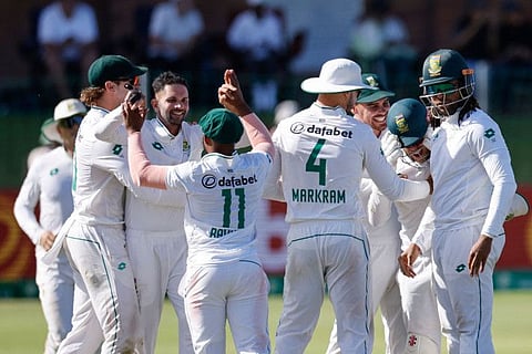 South Africa's Keshav Maharaj (3rd L) celebrates with teammates after the dismissal of Sri Lanka's Kamindu Mendis during the fourth day of the second Test match at St Georges Park in Gqeberha on Sunday.
