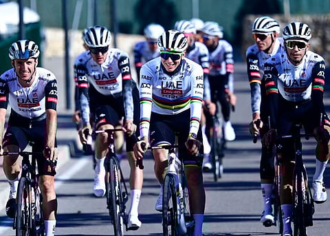 UAE team's Sloveinian cyclist Tadej Pogacar (centre) rides with teammates during a training session in Benidorm on Tuesday.
