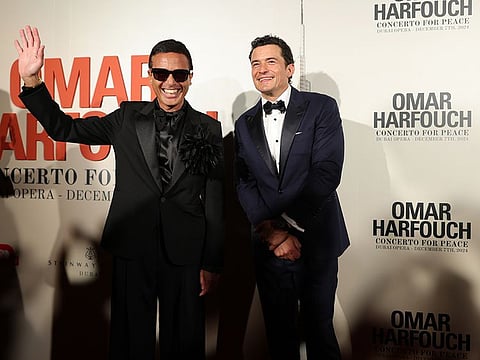 Omar Harfouch along with Hollywood star and UNICEF Ambassador Orlando Bloom at the Concerto for Peace in Dubai.