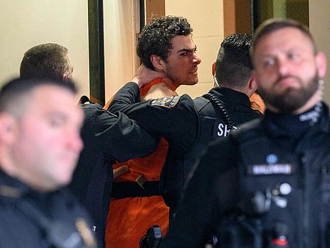Luigi Mangione is led into the Blair County Courthouse for an extradition hearing December 10, 2024 in Hollidaysburg, Pennsylvania.