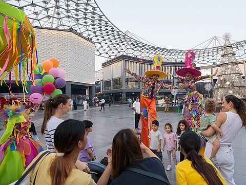 Performers at City Walk. DSF brings shows from all over the world to Dubai.