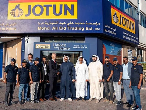 Kjetil Urheim, General Manager, Jotun Paints UAE with Amir Al Marri, 2nd Generation Shop Owner on the day of the inauguration of the newly renovated shop in Bur Dubai, in the presence of senior officials and staff of Jotun Paints and Mohd Ali Eid Trading.