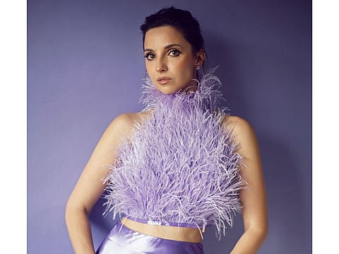 Look for faux-feather accents on cuffs, hems, or clutches