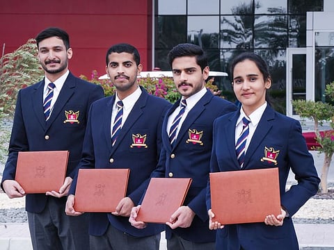 Outstanding cadet pilots (from left) Humaid Al Hammadi, Abdulla Alkaabi, Abdulla Raeisi and Sarah Shah after their graduation ceremony in Dubai on Wednesday