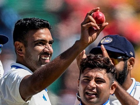 Ravichandran Ashwin, left, celebrates after taking five-wicket haul during the third day of the fifth Test cricket match between India and England on March 9, 2024