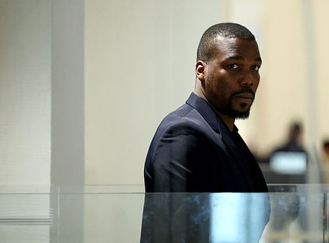 Mathias Pogba is accused of pressurising his brother French football player Paul Pogba and his family, leaves the Paris Criminal Court on November 26.