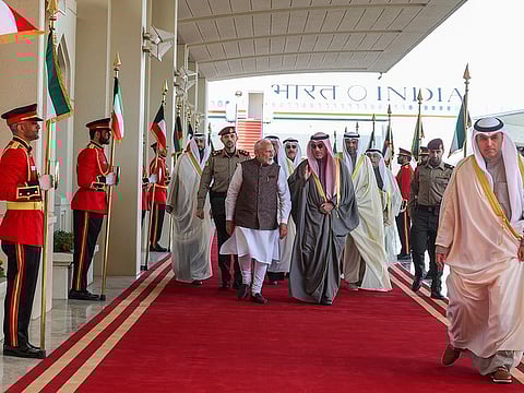 India's Prime Minister Narendra Modi receives a warm welcome on his arrival in Kuwait, on Saturday.