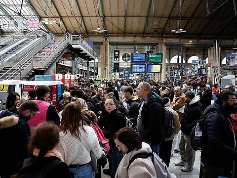 Passengers queue at the departure gates of the Eurostar terminal at Gare du Nord train station, as flooding in a railway tunnel near London forced the cancellation of more than a dozen trains linking Britain with the European mainland, in Paris, France, December 30, 2023.
