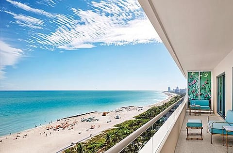 Urban cool meets beachfront chic here – it’s unlikely you’ll want to relax anywhere other than the beach with the backdrop of high-rises.