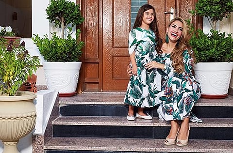 Jumana Al Darwish at home with her daughter, Ayla.
