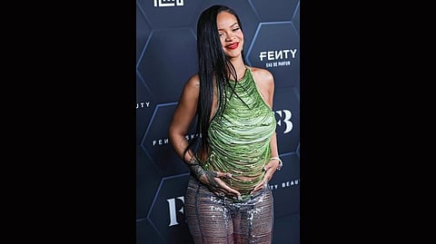 Rihanna is so at ease with her new shape that she doesn’t feel the need to modify her habitually provocative style of dressing
