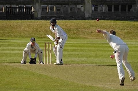 Angus goes over the wicket.