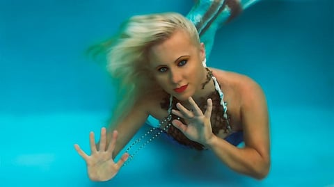 Melissa often spends hours in the water dressed as a mermaid.