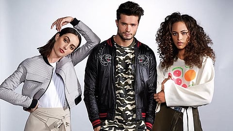 Yolandi: Jacket, Dh950, top, Dh450 and skirt, Dh1,050, all Deborah Henning. Nemanja: Jacket, Dh1,110, T-shirt, Dh450, and trousers, Dh750, all Emperor. Mari: Jumper, Dh940 and skirt, Dh1,350, ASYA Krasnaya.