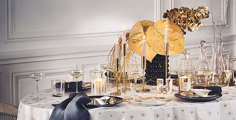 Set a glamorous table with golden accents from H&M Home