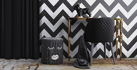 A playful yet contemporary setting is created in this home workspace with the addition of the Young & Battaglia black sleeping log upholstered ottoman