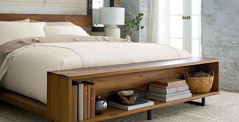This unusual Crate & Barrel bed includes a small shelf that acts as a modern take on the usual blanket box placed at the bottom of the bed.