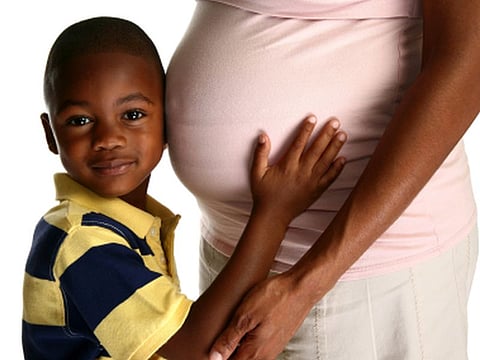 pregnant woman and son
