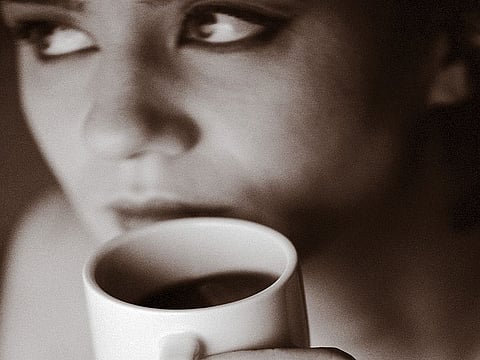 woman drinking coffee
