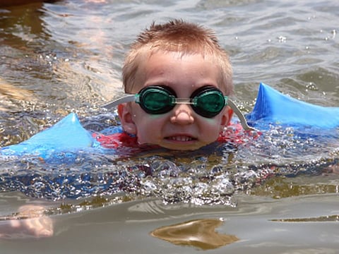 child swimming