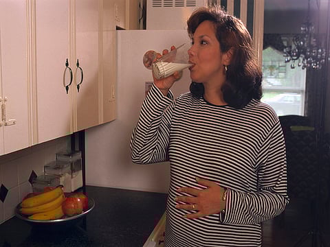 pregnant woman drinking milk