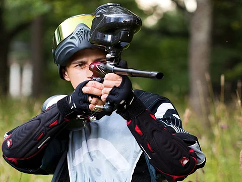 man with paintball gun