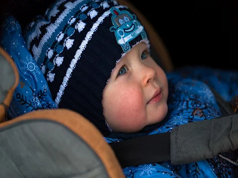 boy in carseat