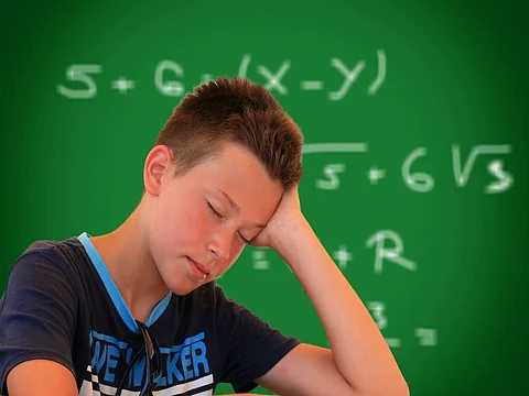 sleepy teen in school
