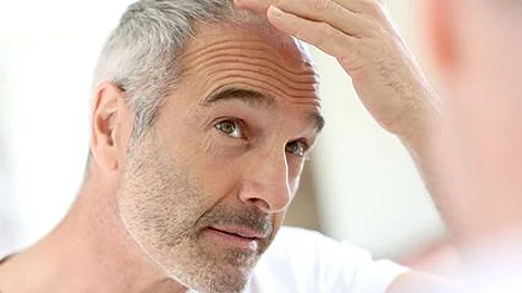 When Will You Go Gray? Your Race Matters