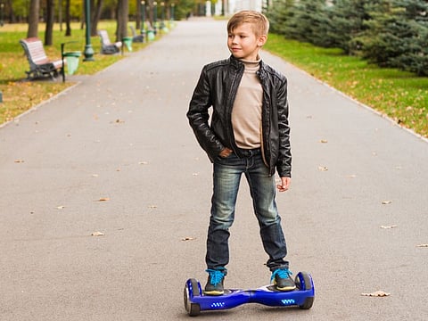 boy on hoverboard