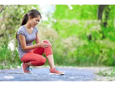 woman with knee pain