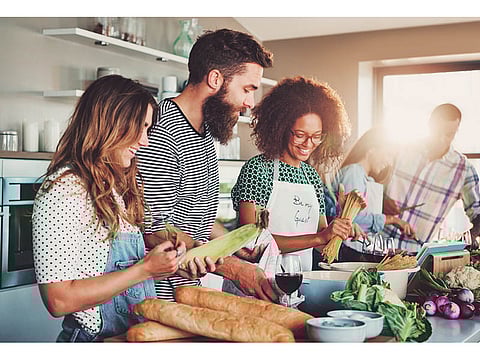 young people preparing a meal