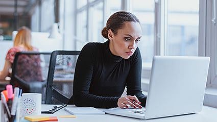 a woman with a laptop