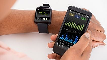 Fitness Trackers Could Get You Stepping More -- Even If You Don't Look at Them