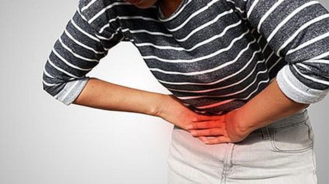 a person with a stomach pain