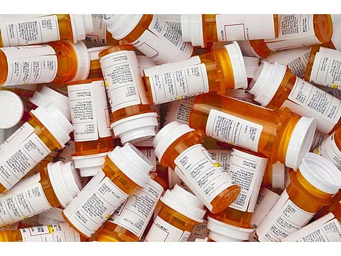 medicine containers with labels
