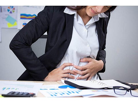 woman with stomach ache