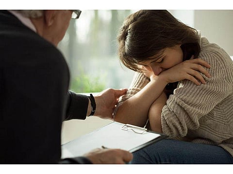 depressed woman and doctor