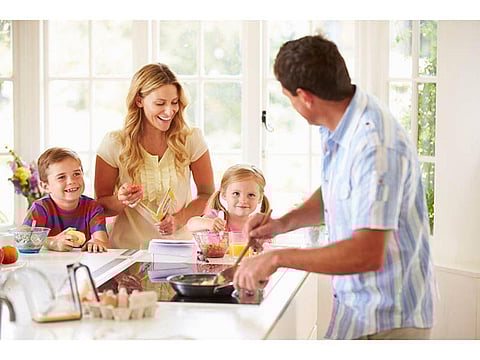 family making breakfast