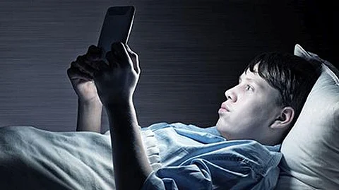 Most Americans Lose Sleep Due to 'Digital Distractions.' Experts Offer Tips to Help