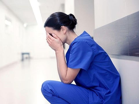 exhausted nurse