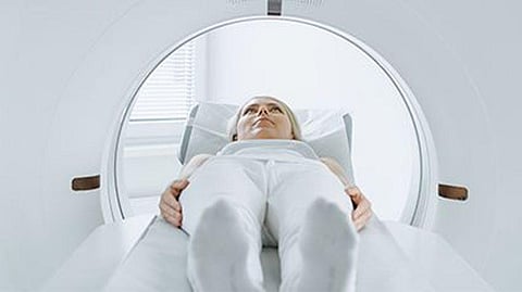 a woman in the MRI scanner